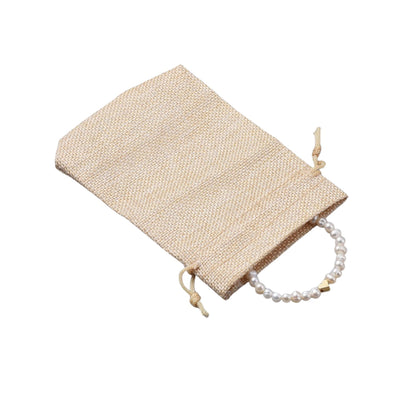 Kinderarmband mit Süßwasserperlen & Herzperle aus Messing – inkl. Sackleinenbeutel