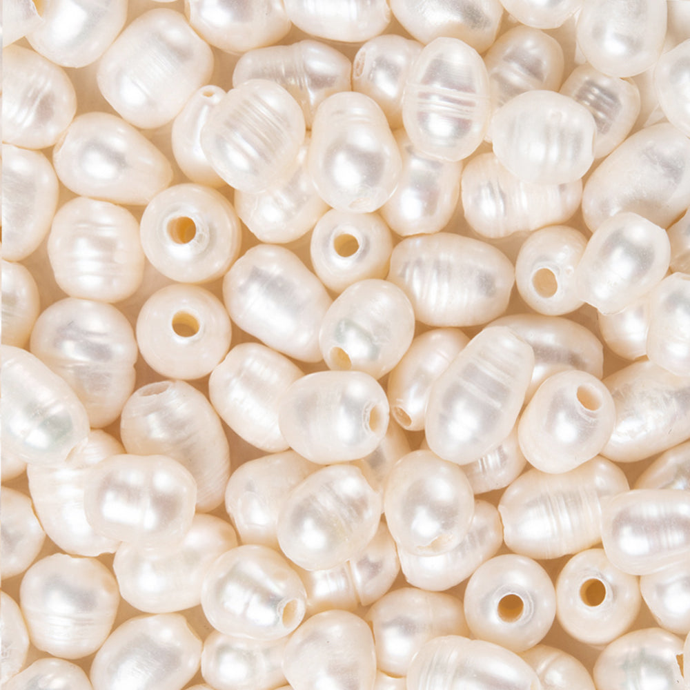 Süßwasserperlen – Reisform, Muschelfarbe, 7–10 mm, 10 Stück