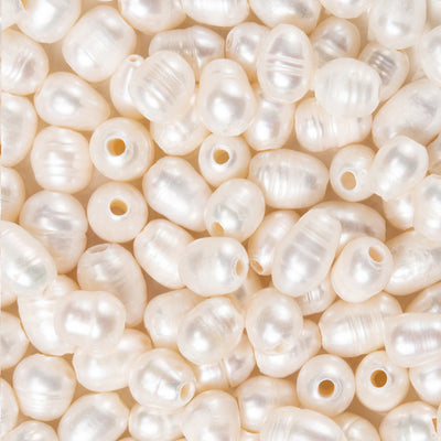 Süßwasserperlen – Reisform, Muschelfarbe, 7–10 mm, 10 Stück