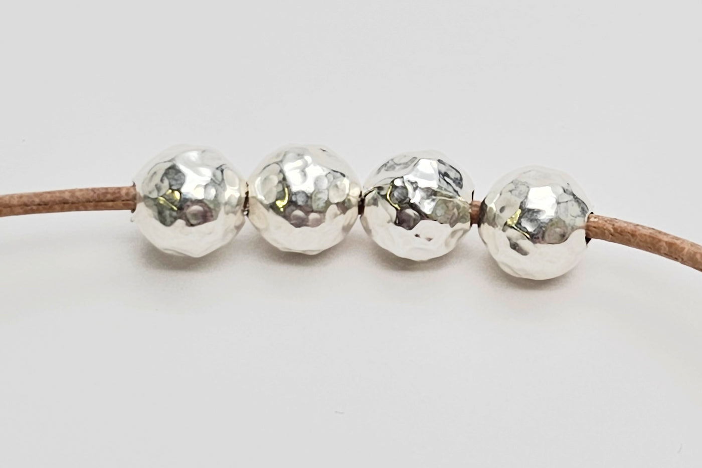 Perlen aus 925 Silber, Ø 6 mm, gehämmert