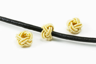 Textillperle, 6,5 x 4,5 mm, 10 Stück