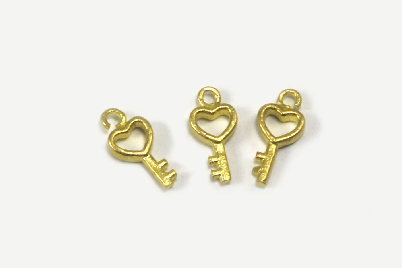 Anhänger aus massivem Messing Schlüssel, Mini, 9 x 4 mm