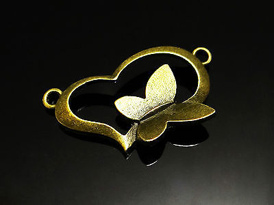 Verbinder Herz mit Schmetterling, 30x18mm bronzefarben
