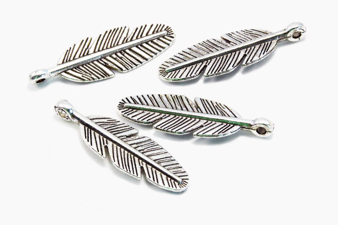 Anhänger Feder, 30 x 9 mm, silberfarben, 5 Stück