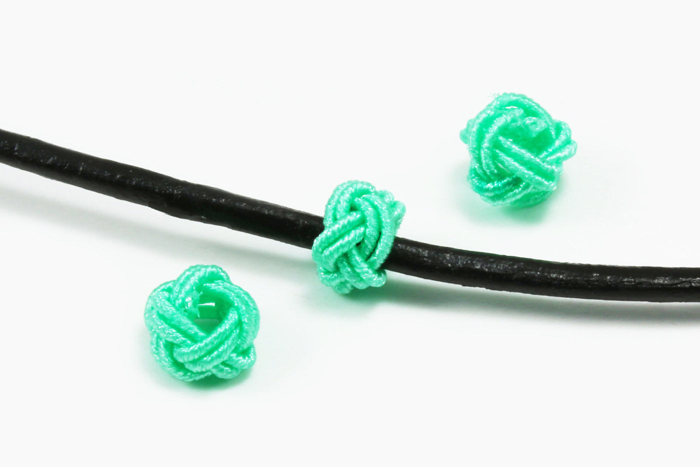 Textillperle, 6,5 x 4,5 mm, 10 Stück